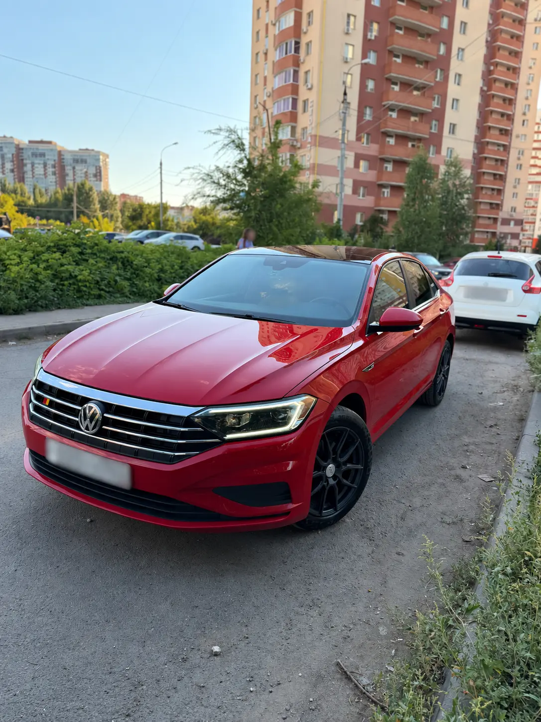 Выкупленный красный автомобиль, государственный номер скрыт